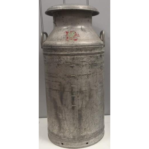 92 - A vintage milk churn, made by 'Swifts of Scarborough Ltd'. Height 74cm.