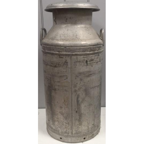 92 - A vintage milk churn, made by 'Swifts of Scarborough Ltd'. Height 74cm.