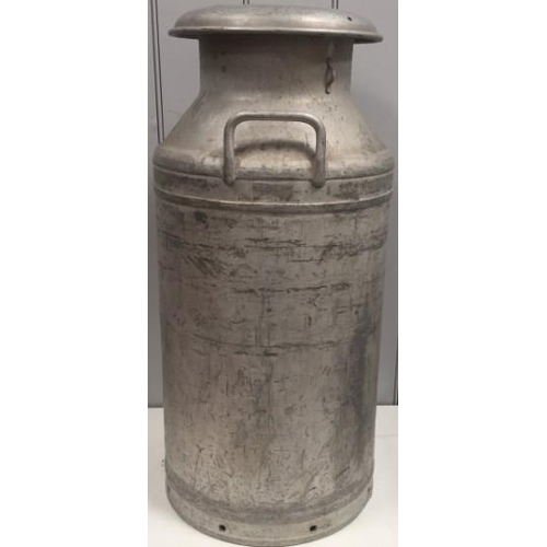 92 - A vintage milk churn, made by 'Swifts of Scarborough Ltd'. Height 74cm.