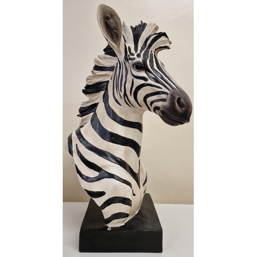 96 - An ornamental, resin zebra head statue. Dimensions(cm) H52, W20, D33.