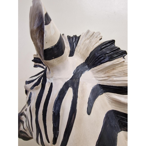 96 - An ornamental, resin zebra head statue. Dimensions(cm) H52, W20, D33.