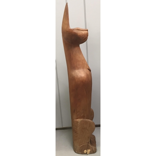 99 - A large-scale, mid-century carved wooden cat figurine. Heavy. Dimensions(cm) H124, W25, D22.