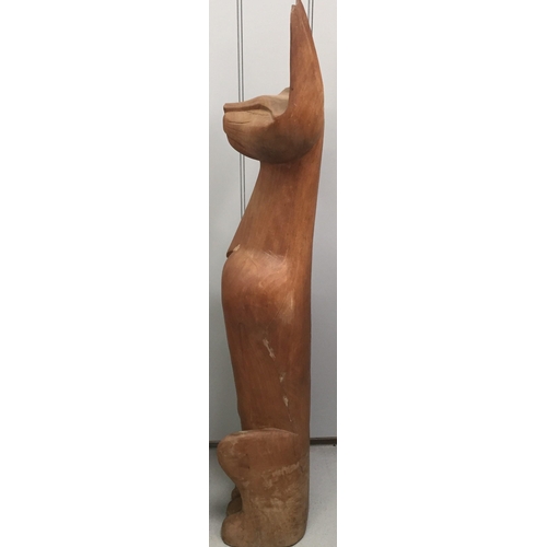 99 - A large-scale, mid-century carved wooden cat figurine. Heavy. Dimensions(cm) H124, W25, D22.