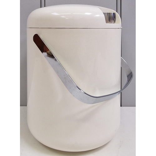 101 - A retro ice bucket, with stainless steel handle & tongs. Height 19cm, diameter 15cm.