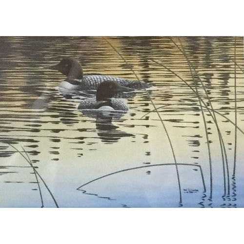 385 - A pair of framed Canadian art prints. To include 'Tranquil Evening Common Loons', by Don Li-Leger & ... 