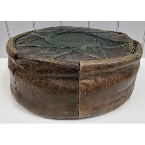 1 - A vintage, North African leather footrest. Height 18cm, diameter 49cm.