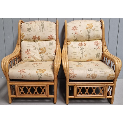 2 - A bamboo & cane conservatory suite, upholstered in a floral patterned beige fabric. To include a two... 