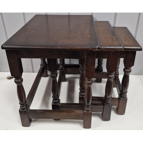 6 - A vintage, oak nest of three tables. Largest dimensions(cm) H47, W51, D39.