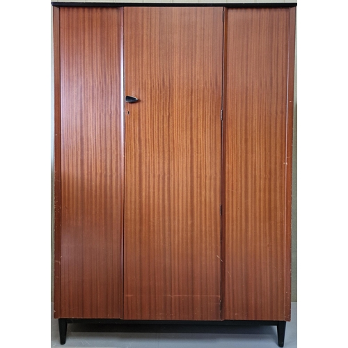23 - A mid-century double wardrobe, with single door, on typical, raised platform legs. Dimensions(cm) H1... 