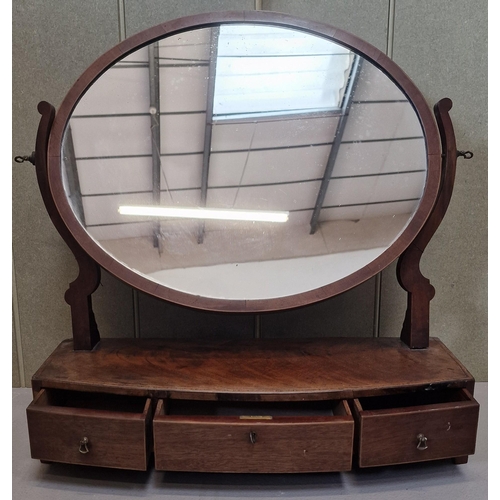 27 - A Regency, mahogany table top dressing mirror. Bow-front, with three drawers & brass fittings. Dimen... 