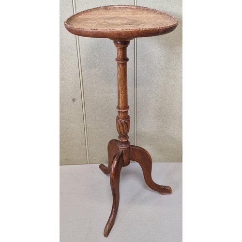 28 - A 19th century, oak wine table, with tripod legs. Dimensions(cm) H67, W29, D29.