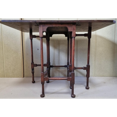 29 - A Georgian, mahogany drop leaf spider table. On turned supports with bun feet. Dimensions(cm) H52, W... 