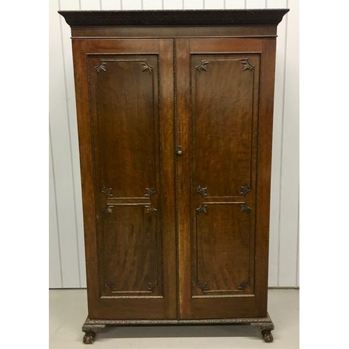 33 - A late 18th century/early 19th century mahogany double wardrobe. Separates into two halves, with bas... 