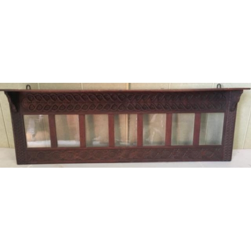 51 - An antique wall-hanging, display shelf, with fine carved detail surround & seven glazed display pane... 