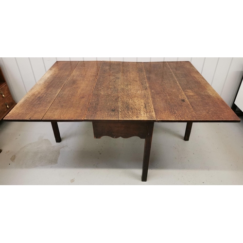 53 - An early 20th century, oak gateleg table. Dimensions(cm) H72, W51/152, D112