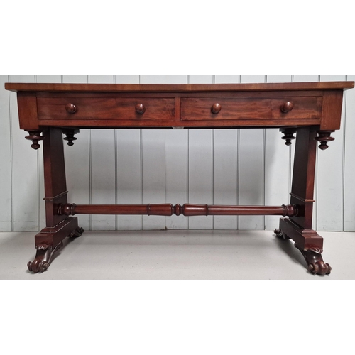 67 - A mid-19th century mahogany, leather-topped, library writing table. Two frieze drawers & decorative ... 