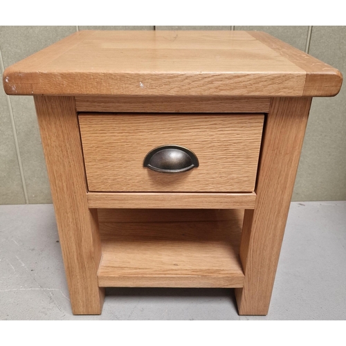 92 - A contemporary, solid oak bedside cabinet. Dimensions(cm) H50, W45, D45.