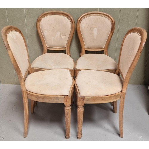 100 - A set of four salon-style walnut dining chairs. Dimensions(cm) H94(50 to seat), W46, D44.