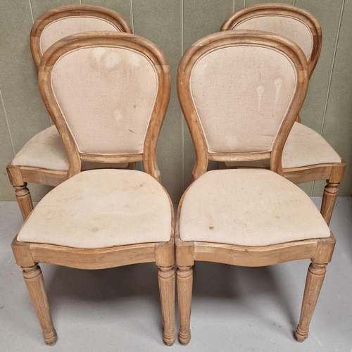 100 - A set of four salon-style walnut dining chairs. Dimensions(cm) H94(50 to seat), W46, D44.