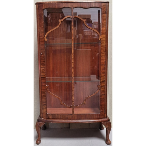 105 - An attractive mahogany veneered display cabinet, with decorated glazed doors, two glass shelves. Key... 