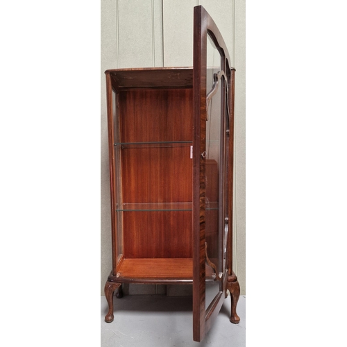 105 - An attractive mahogany veneered display cabinet, with decorated glazed doors, two glass shelves. Key... 
