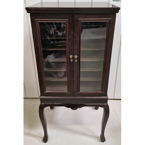 110 - A 19th century mahogany music/display cabinet, with six shelves, supported by Queen Anne style cabri... 