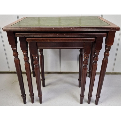 116 - A vintage mahogany nest of three tables, with inset leather tops. Largest dimensions(cm) H51, W55, D... 