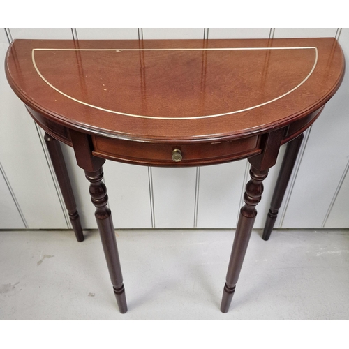 117 - A reproduction, mahogany veneered demi-lune table, with single drawer. Dimensions(cm) H73, W75, D38.