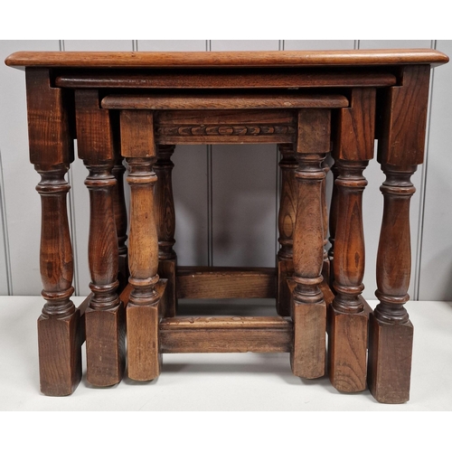 122 - A vintage oak nest of three tables. Largest dimensions(cm) H48, W56, D36.