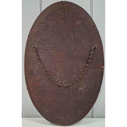 134 - A vintage, bevelled-edged, oval wall hanging mirror. Height 71cm, width 46cm.