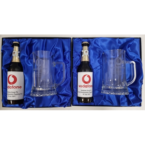 201 - A pair of promotional, beer & glass tankard sets, by Vodafone, dated 26 July 2001.