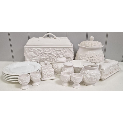 234 - A collection of white ceramic tableware. Seventeen pieces in total.