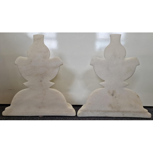 245 - A pair of chess-piece, marble bookends. Height 25cm, diameter 22cm.