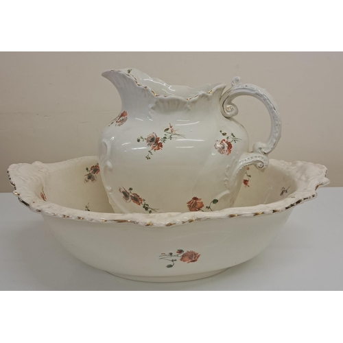 272 - A two-piece wash set by Booth's. To include jug & bowl. Jug height 27cm, washbowl width 47cm.