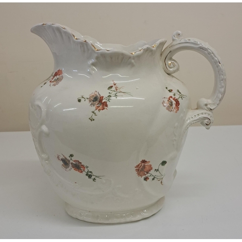 272 - A two-piece wash set by Booth's. To include jug & bowl. Jug height 27cm, washbowl width 47cm.