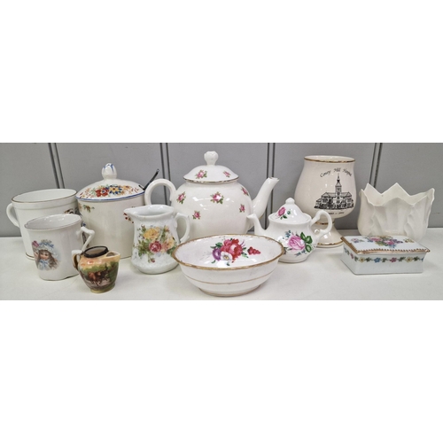 278 - A large collection of approximately 26 decorative ceramic pieces. Makers include Royal Albert, Foley... 