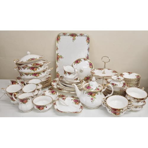 A large quantity of Royal Albert - Old Country Roses tableware. An almost complete tea & dinner service. includes cups, saucers, tea pot, sugar bowl, cake stand and more.