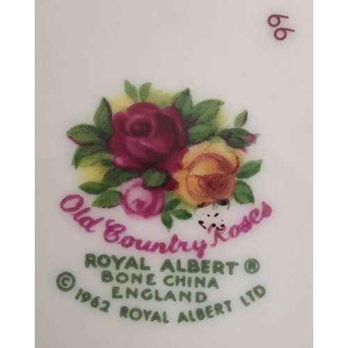 297 - A large quantity of Royal Albert - Old Country Roses tableware. An almost complete tea & dinner serv... 