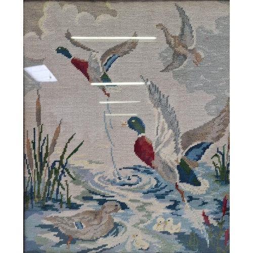 360 - A framed duck pond tapestry. 62cm x 52cm.