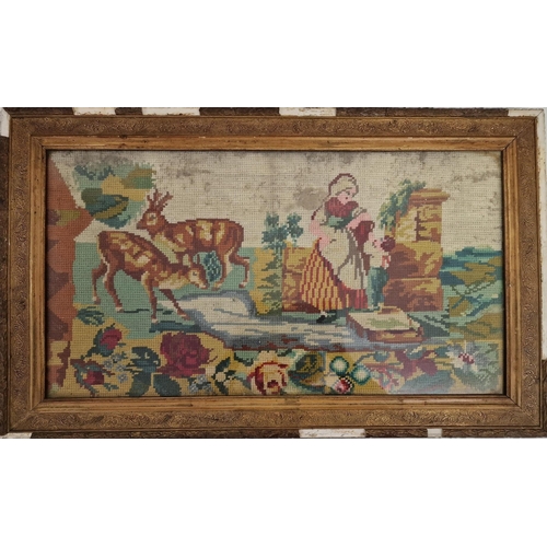 361 - An antique, framed tapestry, depicting a river & deer scene. Framed dimensions 29cm x 64cm.