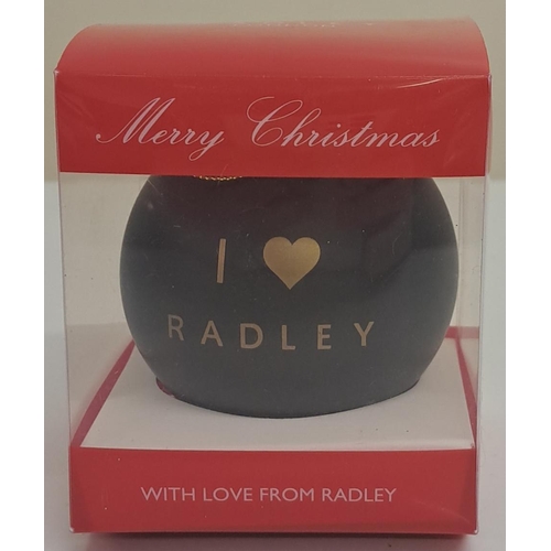 430 - A used 'Radley' brown leather handbag, together with a boxed, limited edition 2012 bauble by the sam... 