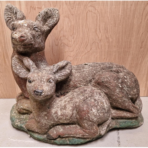 437 - Two stone deer/fawn garden ornaments. Dimensions(cm) H23/40, L25/45, W12/22.