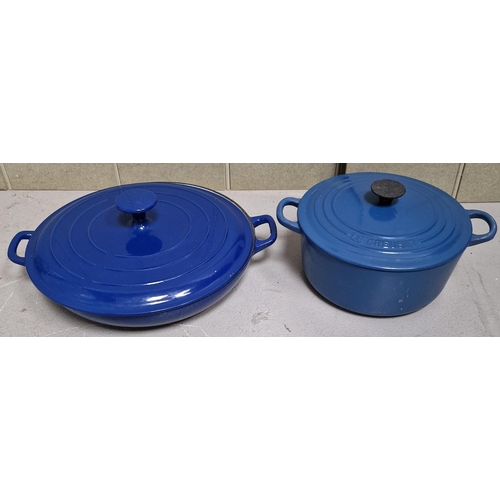 457 - A collection of good quality, used cast iron cookware & chopping board. To include 'Le Creuset'.