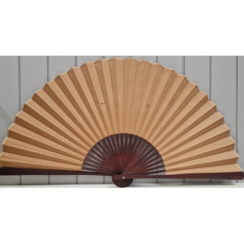 463 - A beautiful oriental wall fan. Dimensions(cm) H71, W130.