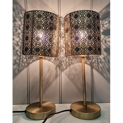 478 - A pair of contemporary table lamps, together with another single lamp. PAT test passes & functionali... 