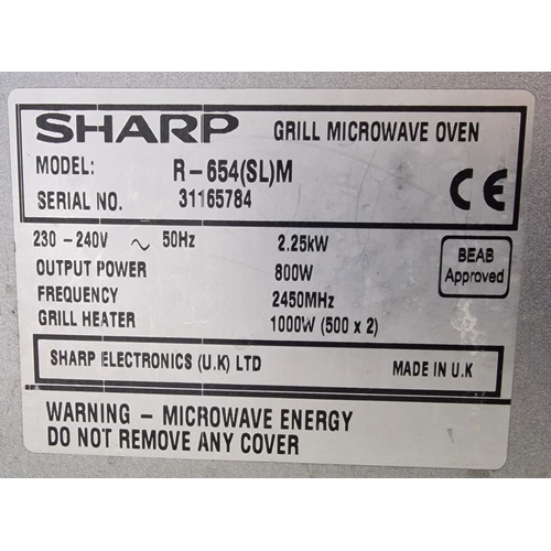 493 - A Sharp 800W Dual Grill/Microwave, model no. R-654(SL)M. PAT test pass & functionality test indicate... 