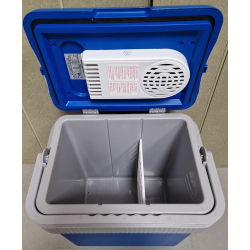 499 - A 'Best' portable 24L electric cooler, model no. BCR-24. Complete with extending handle, mains adapt... 