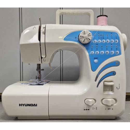 540 - A 'Hyundai' electric sewing machine, model no. 60 STITCH. Complete with original box & instruction m... 