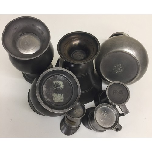 352 - A collection of seven Victorian-era vintage pewter items. To include a lidded sugar pot, spittoon, e... 