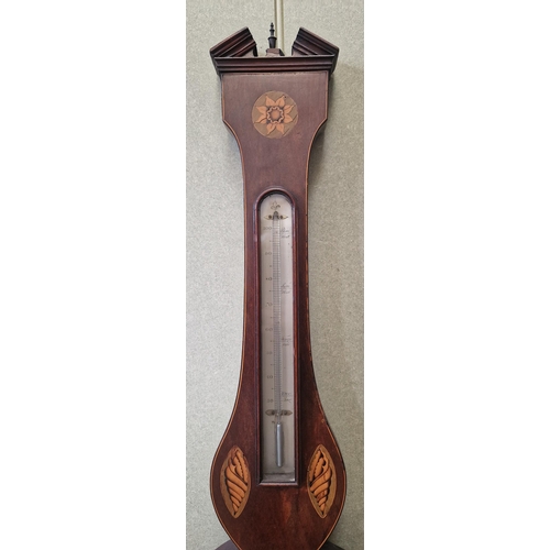 603 - An inlaid mahogany, Georgian wheel barometer. Dial marked 'Frn. Wright' & dated 1805. Appears in wor... 